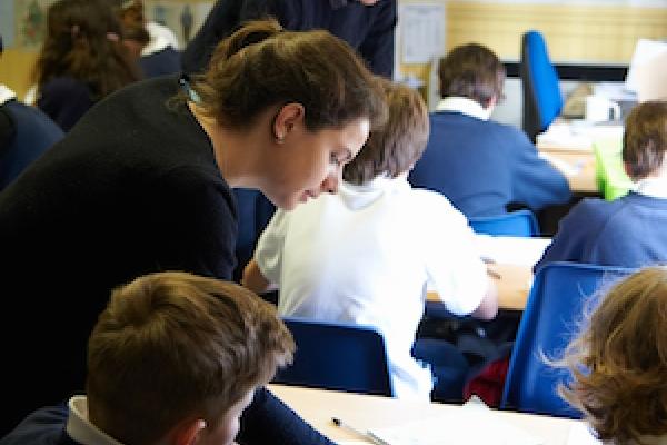 Two_students_helping_pair_crop